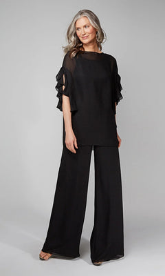 A woman with long, wavy gray hair wears the Alyce 27633 long formal jumpsuit, featuring sheer ruffled sleeves and wide-leg pants, standing against a plain gray background.
