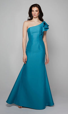 Woman models the Alyce 27641 long formal dress—a teal, floor-length, one-shoulder gown with ruffle shoulder detail—against a plain gray background.