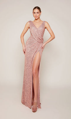 A woman in the Alyce 27653 long formal dress in light mauve, featuring sequins, a thigh-high slit, and a draped bodice, stands against a plain light background.