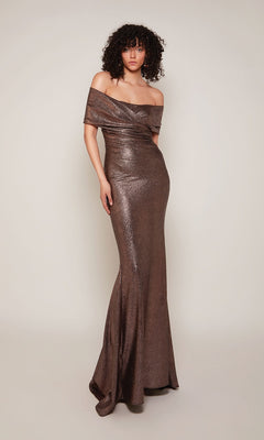 A woman models the Alyce 27666 long formal dress, a metallic off-the-shoulder mother-of-the-bride evening gown, standing against a plain light background.