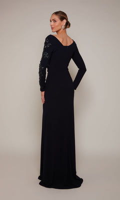 A woman, hair in a low bun, models the Alyce 27675 long formal dress with beaded detailing and one embellished sleeve, facing away against a plain background.