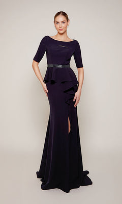A woman poses elegantly against a plain light background in the Alyce 27679 long formal dress—deep purple, featuring short sleeves, a peplum design, belted waist, and side slit.