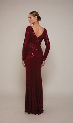 A woman faces away in the Alyce 27688 long-sleeved, floor-length deep red sequin evening dress with a V-back—a stunning choice for a mother-of-the-bride.