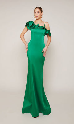 A woman models the Alyce 27691 long formal dress—an emerald green satin gown with a fitted silhouette, thin shoulder straps, and an asymmetrical ruffled neckline—set against a plain background.