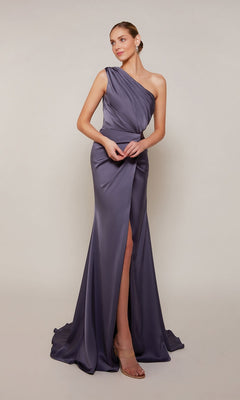 A woman wears the Alyce 27697 long formal dress in Storm Cloud, a floor-length, one-shoulder satin gown with a thigh-high slit—ideal for prom or any formal event, shown against a plain light background.