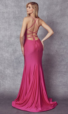 A woman wears the Stone-Embellished Long Formal Prom Dress 276—a fitted, hot pink, floor-length gown with a crisscross open back and subtle stone embellishments—standing against a gray textured background.