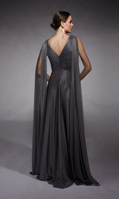 A woman faces away from the camera in the Alyce 27720, a floor-length metallic chiffon formal dress with draped cape sleeves and a V-back—an elegant choice for a sophisticated mother of the bride.