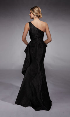 A woman with blonde hair in a low bun wears the Alyce 27732 Long Formal Dress—a black, one-shoulder, floor-length gown with a fitted bodice and flared skirt—while standing with her back to the camera.