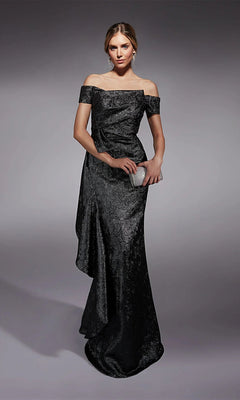 A woman in the Alyce 27735 long formal dress, off-the-shoulder and floor-length, holds a small silver clutch while standing against a plain gray background.