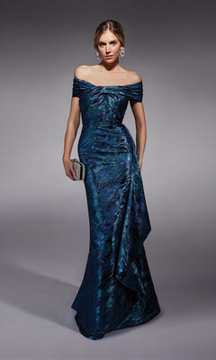 Woman in the royal Long Formal Dress: Alyce 27737, styled with a silver clutch and statement earrings—an elegant mother-of-the-bride look, posed against a plain gray background.