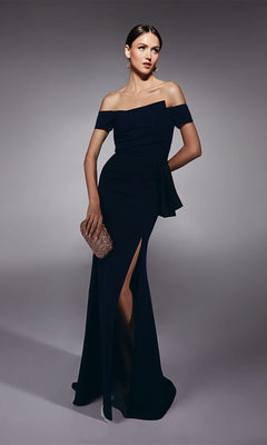 Woman wearing the Alyce 27744 long formal dress in Midnight, featuring an off-the-shoulder design and high-leg slit. She holds a textured clutch and stands against a gray background.