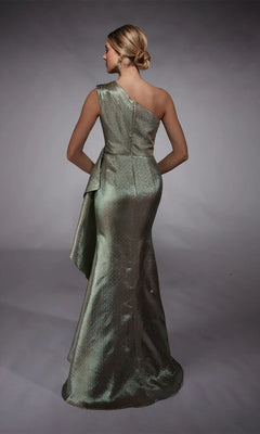 A woman stands on a gray backdrop wearing the Long Formal Dress: Alyce 27751—a metallic one-shoulder gown with an asymmetrical draped back, perfect as an elegant, modern mother-of-the-bride look.