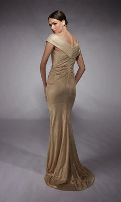 A woman poses in the Alyce 27762 long formal dress—a gold, off-the-shoulder evening gown with a fitted, ruched back and floor-length hem—ideal as a glamorous mother of the bride dress, set against a neutral studio background.