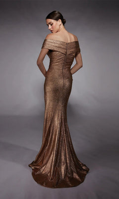 Model in the Alyce 27767 Long Formal Dress, an off-the-shoulder metallic bronze gown with a fitted bodice and flared train, poses against a neutral gray background.