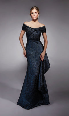 A woman poses against a plain gray background wearing the Alyce 27774 long formal dress in navy, featuring an off-the-shoulder neckline, fitted bodice, side draping, and a flared mermaid skirt.