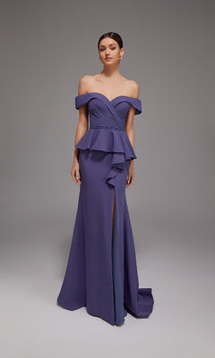 A woman models the Alyce 27829 long formal dress, featuring off-the-shoulder sleeves, a peplum waist, and a front slit in purple—ideal for special occasions—against a plain gray background.