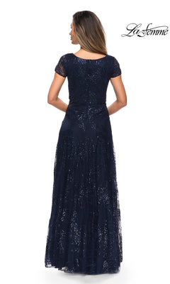 Back view of the Long Formal Dress: La Femme 27837, a floor-length navy blue gown featuring short sleeves and an all-over floral sequin pattern.