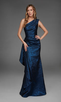 A woman stands against a plain gray background wearing the Alyce 27885, a long formal dress featuring a floor-length, one-shoulder design in dark blue with a textured pattern.