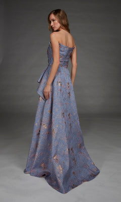 Wearing the Alyce 27893 Long Formal Dress, a floor-length, strapless gown featuring lavender jacquard fabric with metallic floral patterns, a woman poses elegantly in a studio.