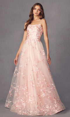 A woman wearing the Embroidered-Lace Long A-Line Prom Ball Gown 279, featuring thin straps and a floor-length design, stands against a plain gray background.