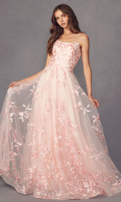A woman models the Embroidered-Lace Long A-Line Prom Ball Gown 279, a floor-length light pink dress with floral embroidery and thin straps, holding out the skirt against a plain gray background.