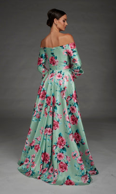 Wearing the Long Formal Dress: Alyce 27910—a floor-length, off-the-shoulder mint green gown adorned with a pink and red floral pattern—a woman stands facing away against a neutral background.