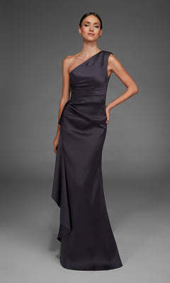 A woman wearing the Alyce 27913 long formal dress, featuring a floor-length silhouette, one-shoulder neckline, and elegant draped detailing in sleek satin, stands against a plain gray background.