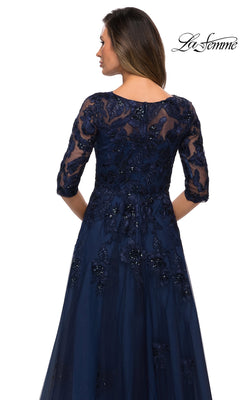 Back view of a navy blue floor-length La Femme 27922 mother-of-the-bride dress with three-quarter sleeves, floral lace embroidery, and sequin bodice embellishments.
