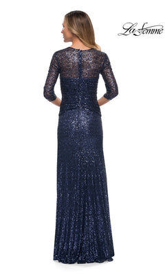 Woman wearing Long Formal Dress: La Femme 27930—navy blue, floor-length with sequins, half sleeves, and sheer back—standing with her back to the camera.