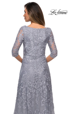 Back view of a woman in a silver gray La Femme 27949 formal dress, featuring embroidered lace and knee-length sleeves, perfect for evening weddings.