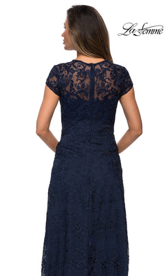 Back view of the Long Formal Dress: La Femme 27951, a floor-length navy blue floral lace gown featuring a cap-sleeve overlay and intricate embroidery.
