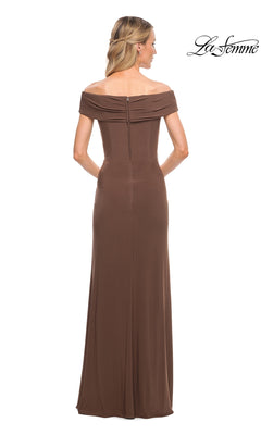 Woman wearing the Long Formal Dress: La Femme 27959, a brown, off-the-shoulder jersey gown, floor-length, shown from the back with her hair half pulled back.