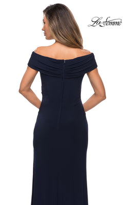 A woman models the Long Formal Dress: La Femme 27959—an off-the-shoulder, navy blue, floor-length jersey dress with a back zipper. The La Femme logo appears at top right.