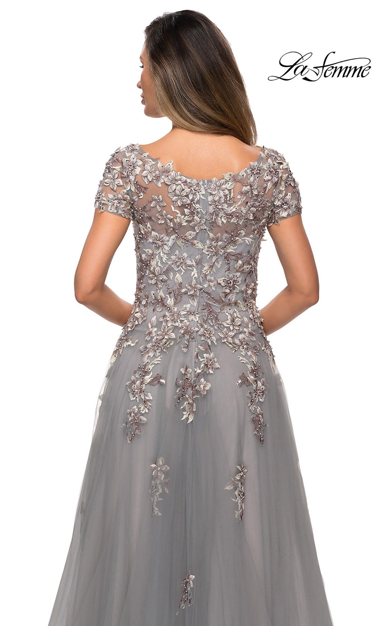 Back view of the Long Formal Dress: La Femme 27968, a silver gray gown with short sleeves and floral embroidery over a sheer bodice.
