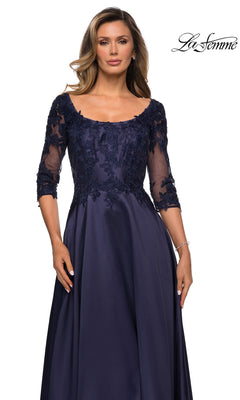 La Femme 27988 navy blue A-line evening gown with a scoop neckline, three-quarter length lace sleeves, and a floral lace bodice.