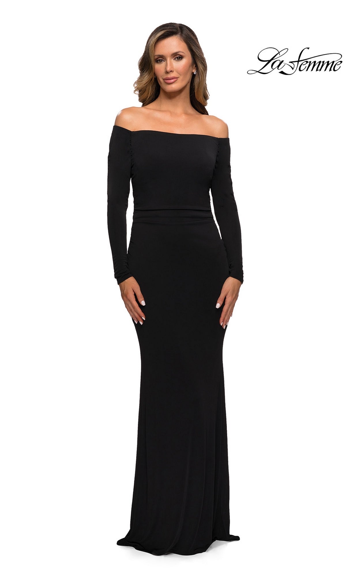 Woman wearing the Long Formal Dress: La Femme 28054 in black with a sheath silhouette and long sleeves, standing against a white background with the “La Femme” logo in the corner.