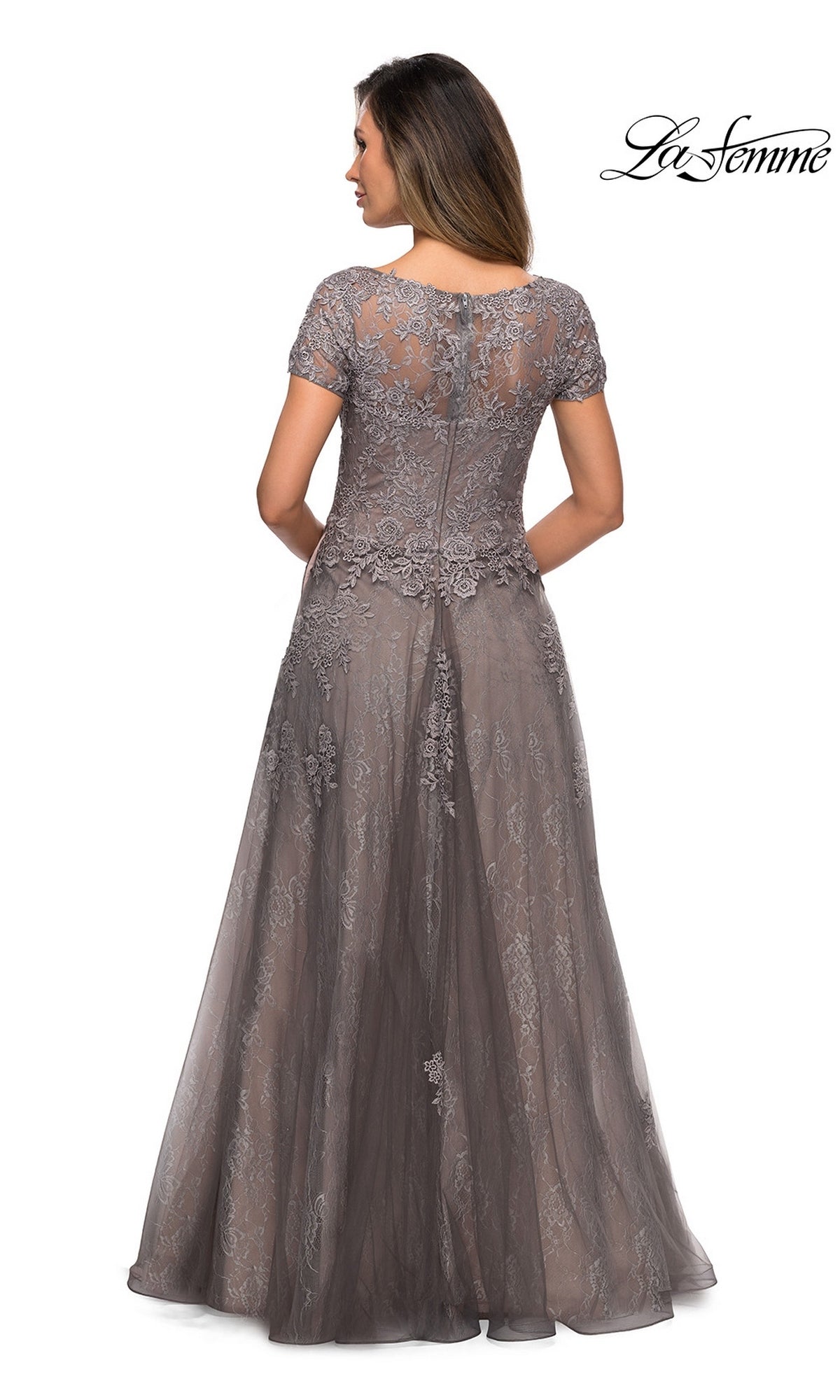 Back view of a floor-length platinum La Femme 28091 formal dress featuring short sleeves and a floral lace overlay.