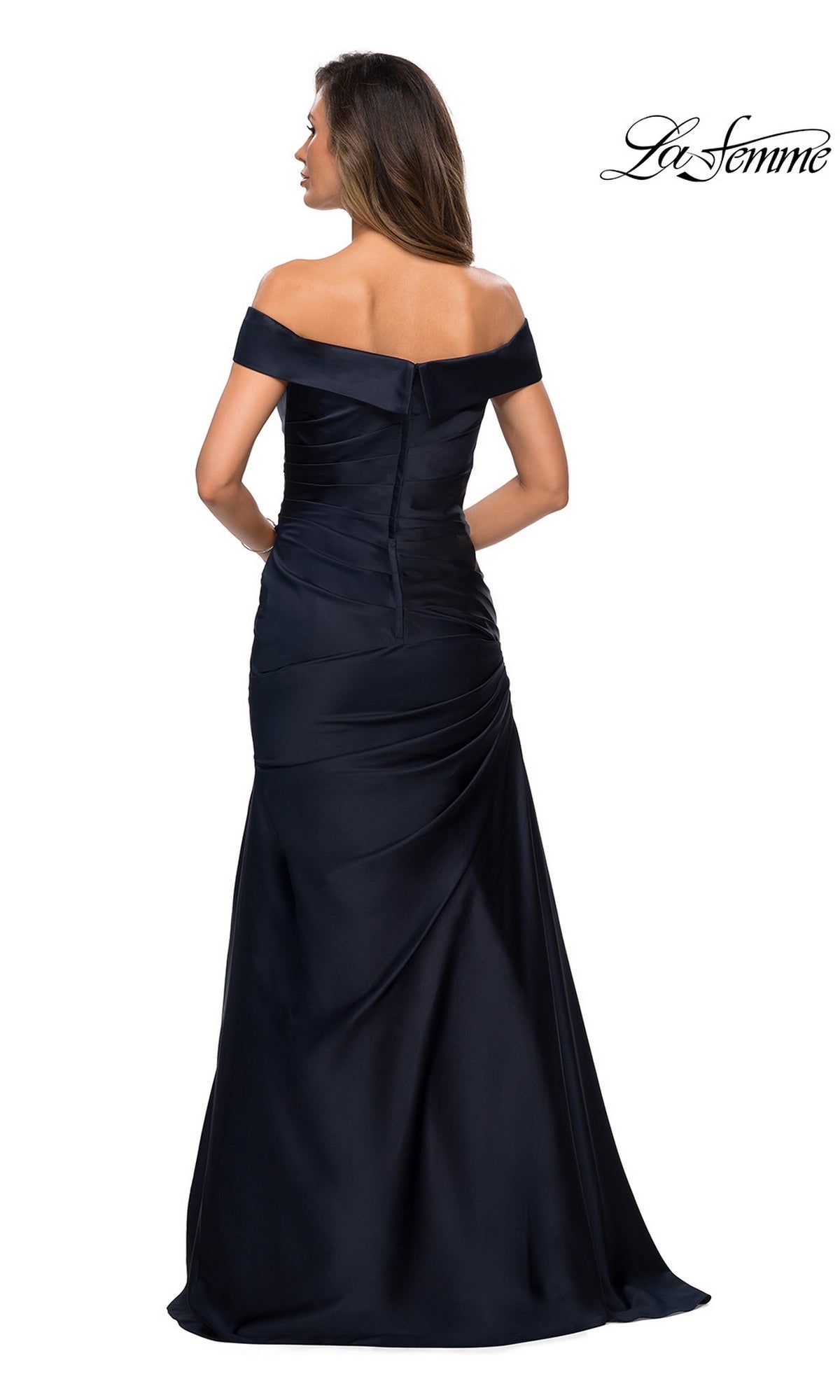 A woman is seen from the back, wearing the Long Formal Dress: La Femme 28103—a fitted, off-the-shoulder, floor-length black gown with an elegant neckline—against a white background, with the “La Femme” logo displayed in the top right corner.