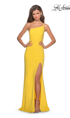 A woman stands with hands on hips, facing forward against a plain white background, wearing the La Femme One-Shoulder Long Formal Dress 28176 in bright yellow with a thigh-high slit.