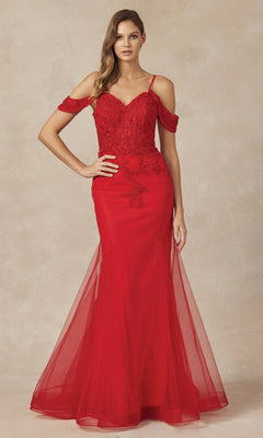 A woman stands against a neutral background wearing the Juliet 281, a long glitter mermaid prom dress featuring an off-the-shoulder design, lace detailing, and a fitted bodice.