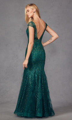 A woman models the Feathered Cap-Sleeve Long Prom Dress: Juliet 286, a fitted green mermaid gown with cap sleeves, deep V-back, and shimmering textured pattern, standing against a plain gray background.