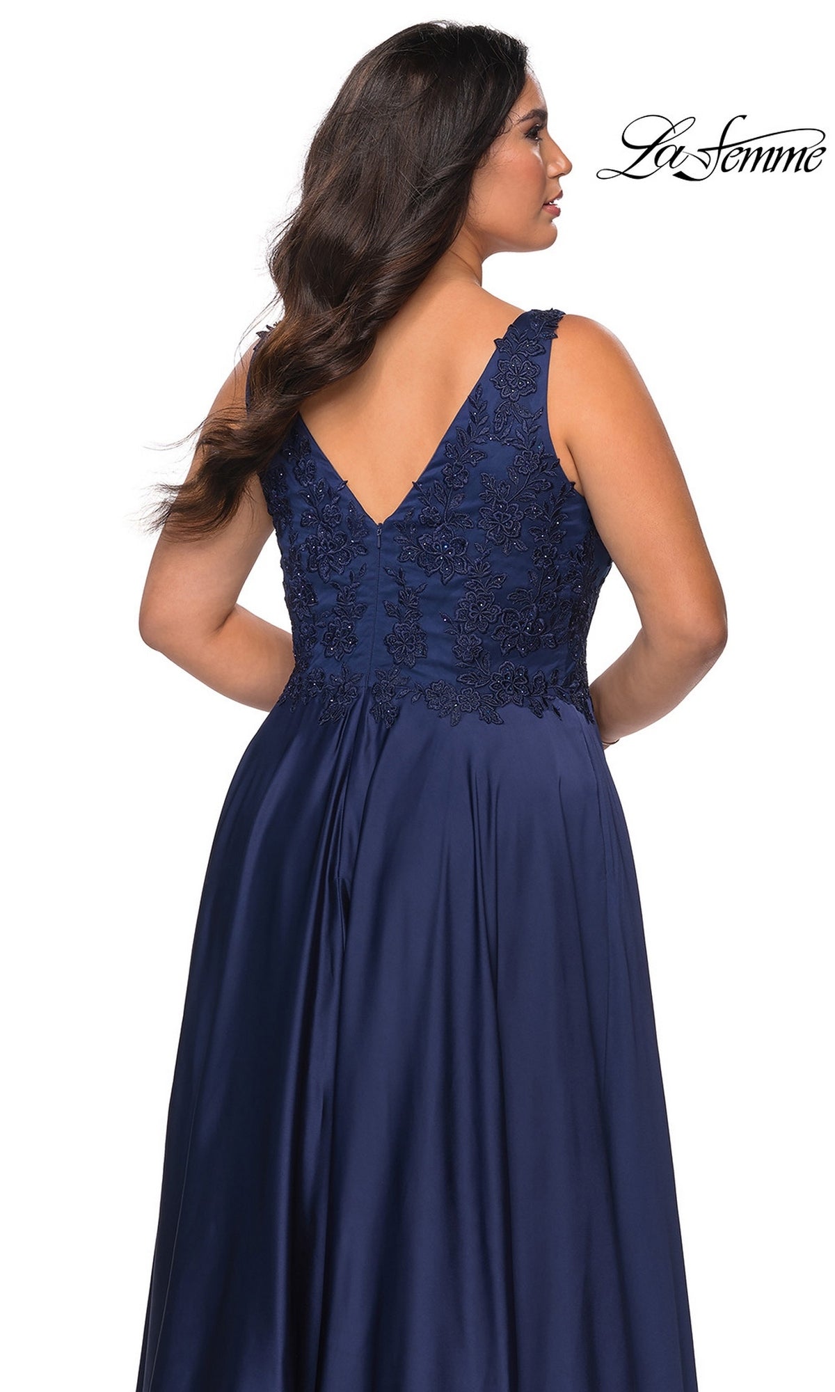 Back view of the Long Plus-Size Prom Dress: La Femme 29039, a navy blue sleeveless dress with a V-neckline, rhinestone lace embellishments, and functional pockets.