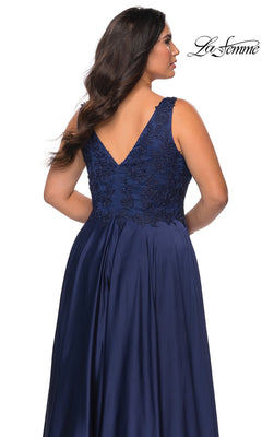 Back view of the Long Plus-Size Prom Dress: La Femme 29039, a navy blue sleeveless dress with a V-neckline, rhinestone lace embellishments, and functional pockets.