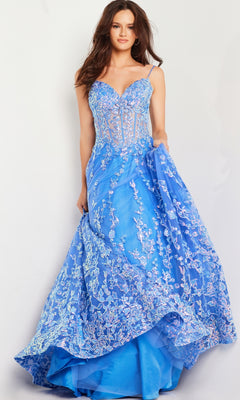 A woman in the Long Prom Dress 29072 by Jovani, a strapless turquoise blue ball gown with a sheer bodice and floral sequin embroidery, stands against a plain background holding part of her skirt.