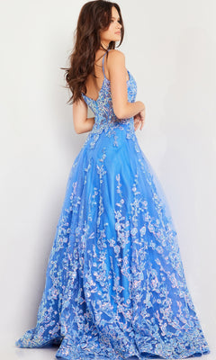 A woman, seen from behind with loose wavy hair, wears the Long Prom Dress 29072 by Jovani—a turquoise blue gown with floral sequin embroidery and thin shoulder straps.