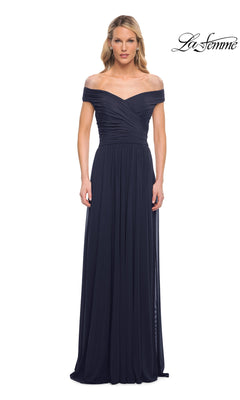 A woman faces forward in the Long Formal Dress: La Femme 29168, a navy, off-the-shoulder gown with a ruched bodice and A-line skirt. The “La Femme” logo is at the top right.