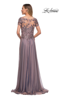 A back view of the La Femme 29235 formal dress, featuring a dark mauve floor-length chiffon skirt and a short-sleeved illusion bodice with dark floral embroidery.