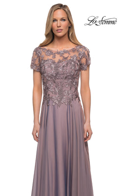 La Femme 29235 dark mauve floor-length gown with a short-sleeved illusion neckline and floral embroidery on the bodice, finished in a modest evening dress silhouette.