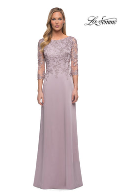 Woman in a long, light mauve Long Formal Dress: La Femme 29251 with lace and sheer three-quarter sleeves; “La Femme” logo at top right.