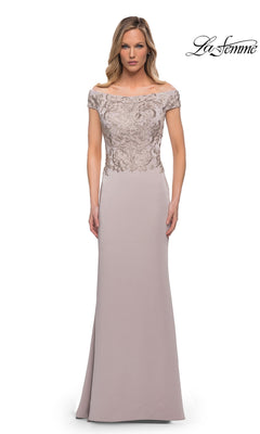 Woman wears Long Formal Dress: La Femme 29331—an off-the-shoulder, floor-length lavender gown with embroidered fitted bodice and cap sleeves. White background, “La Femme” logo top right.